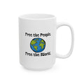 A white ceramic mug with a printed graphic of a globe and the text 'Free the People. Free the World.