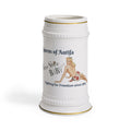 A white ceramic beer stein with gold trim, featuring a vintage-style illustration of a pin-up girl and the text 'Queens of Antifa' and ‘Shoo Shoo Baby with musical notes.
